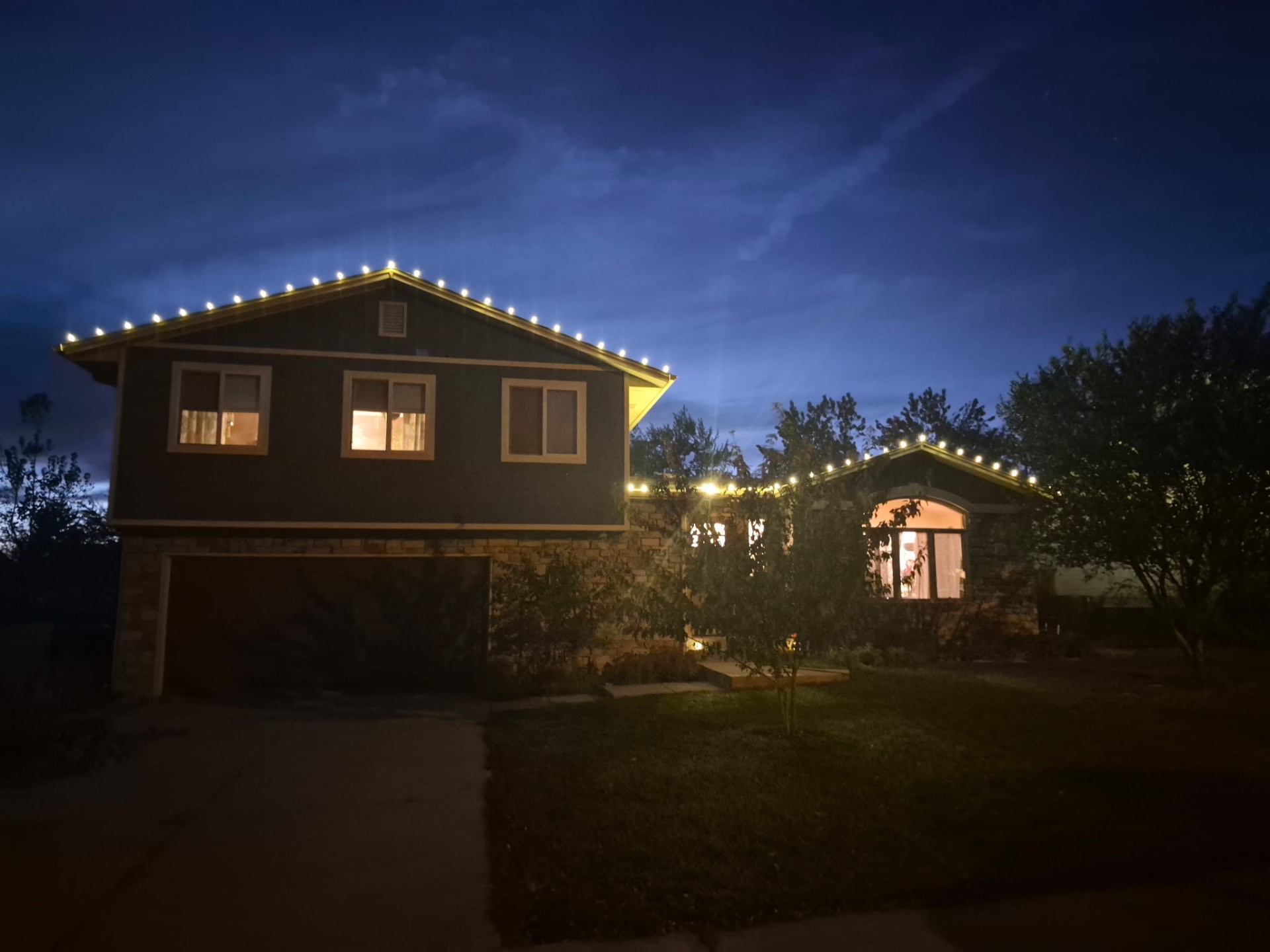 Roofline Christmas lights installed by Mile High Holiday Lighting, home 1